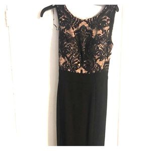 R & M Richards long evening gown with tied waist.